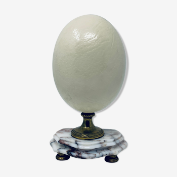 Ostrich egg mounted on marble pedestal