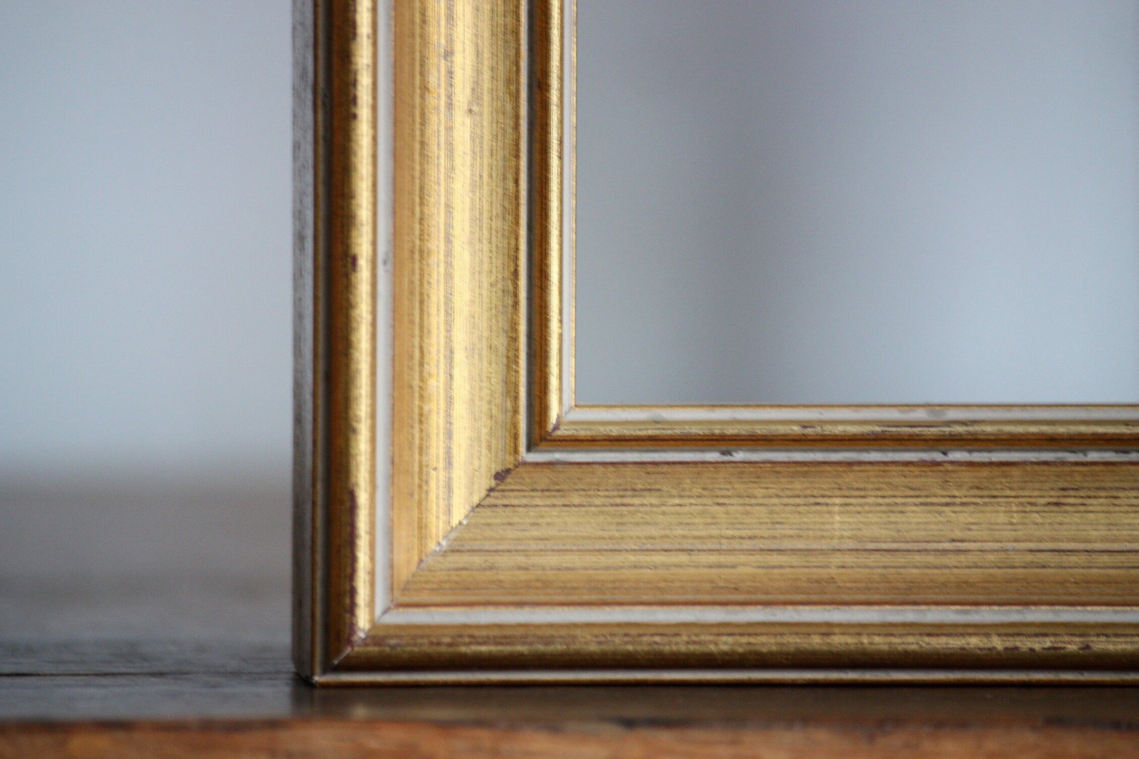 Moulded gilded wood frame