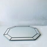 Old octagonal beveled mirror with parcloses