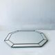 Old octagonal beveled mirror with parcloses