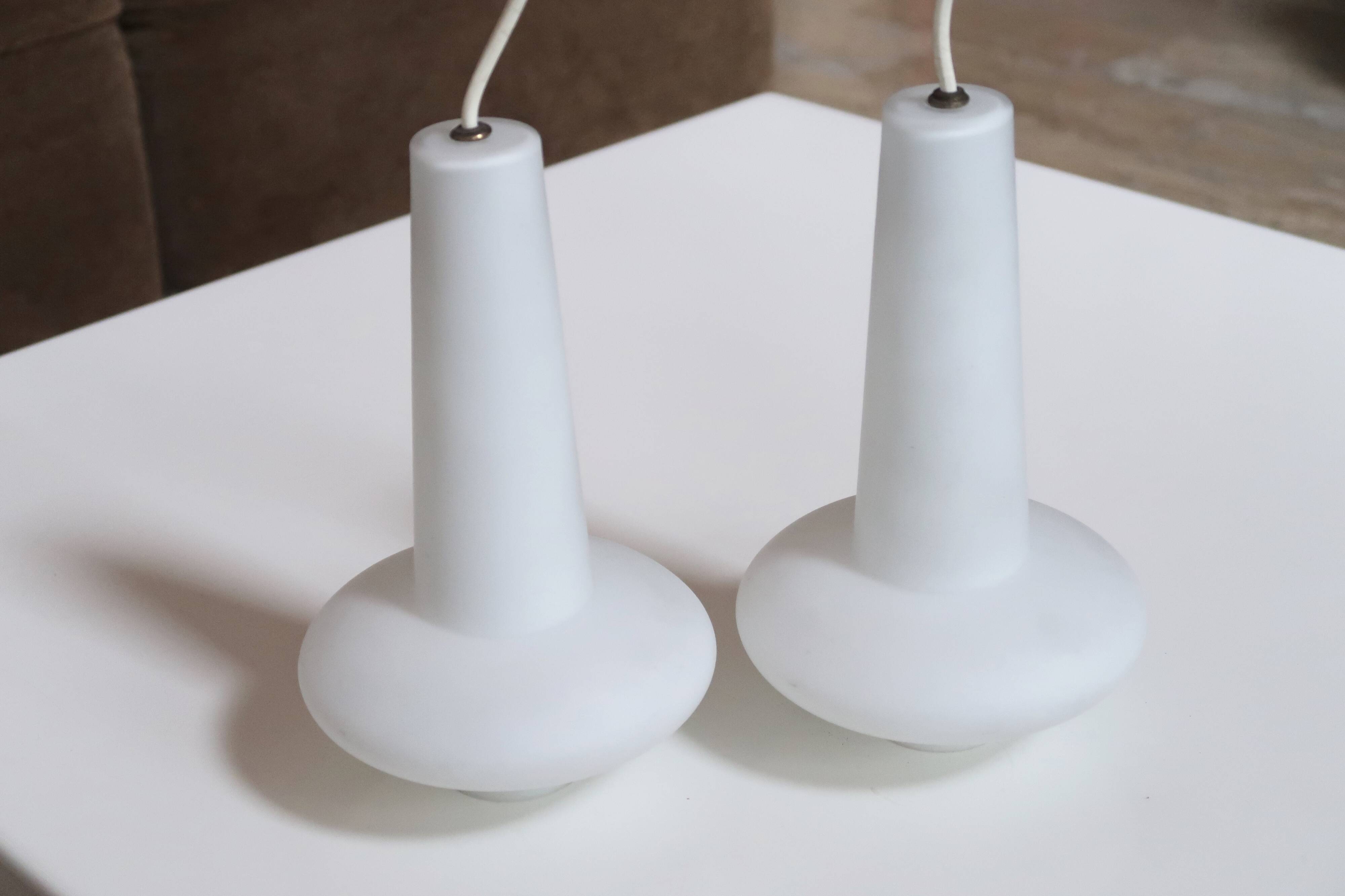 Pair of white opaline suspensions, 50s