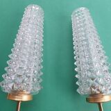 Pair of large gold wall lights with tulip-shaped globes by Arlus