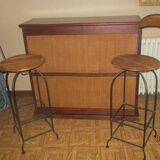 Exotic bar and wrought iron stools