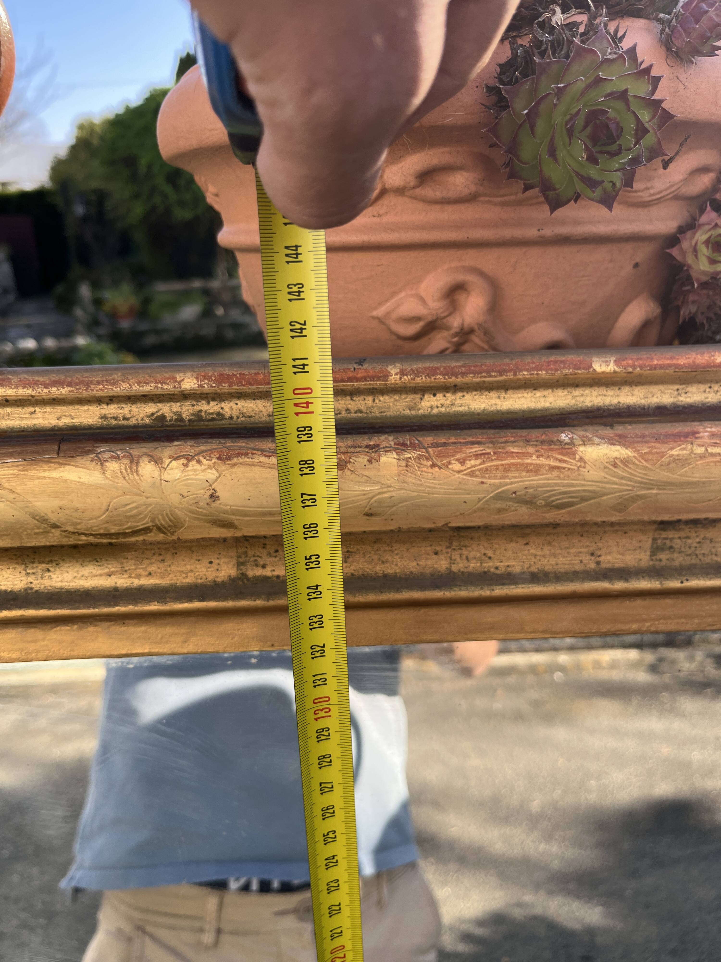 Large Louis-Philippe gilded mirror with gold leaf