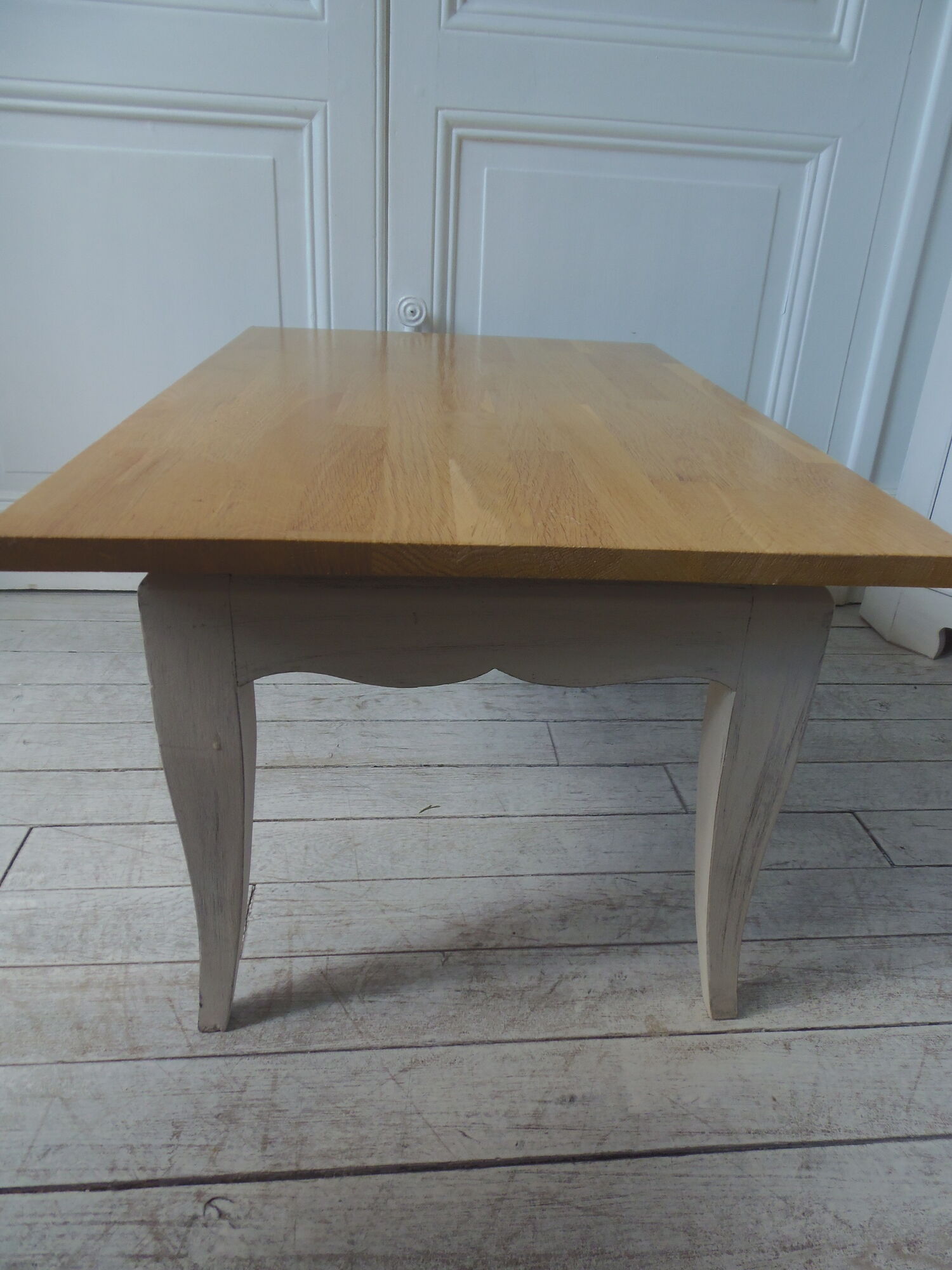 Vintage coffee table patinated pearl gray waxed finish, top against glued varnished oak