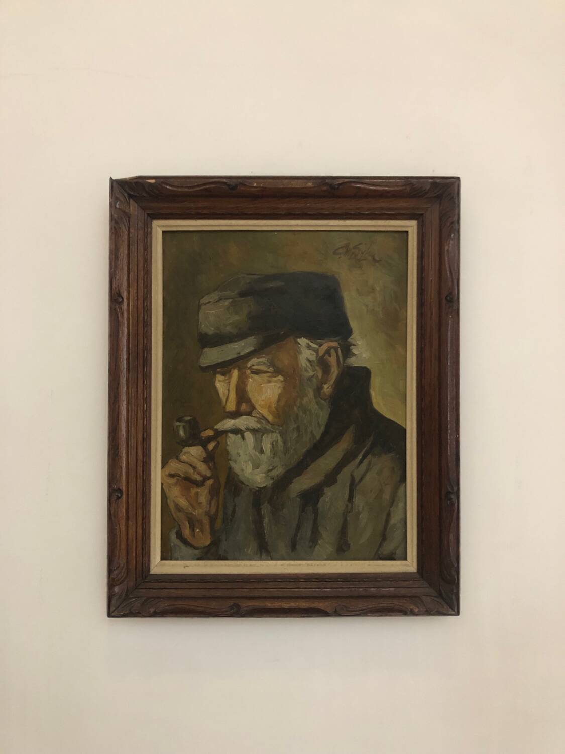 Oil on panel portrait of elderly man with pipe signed