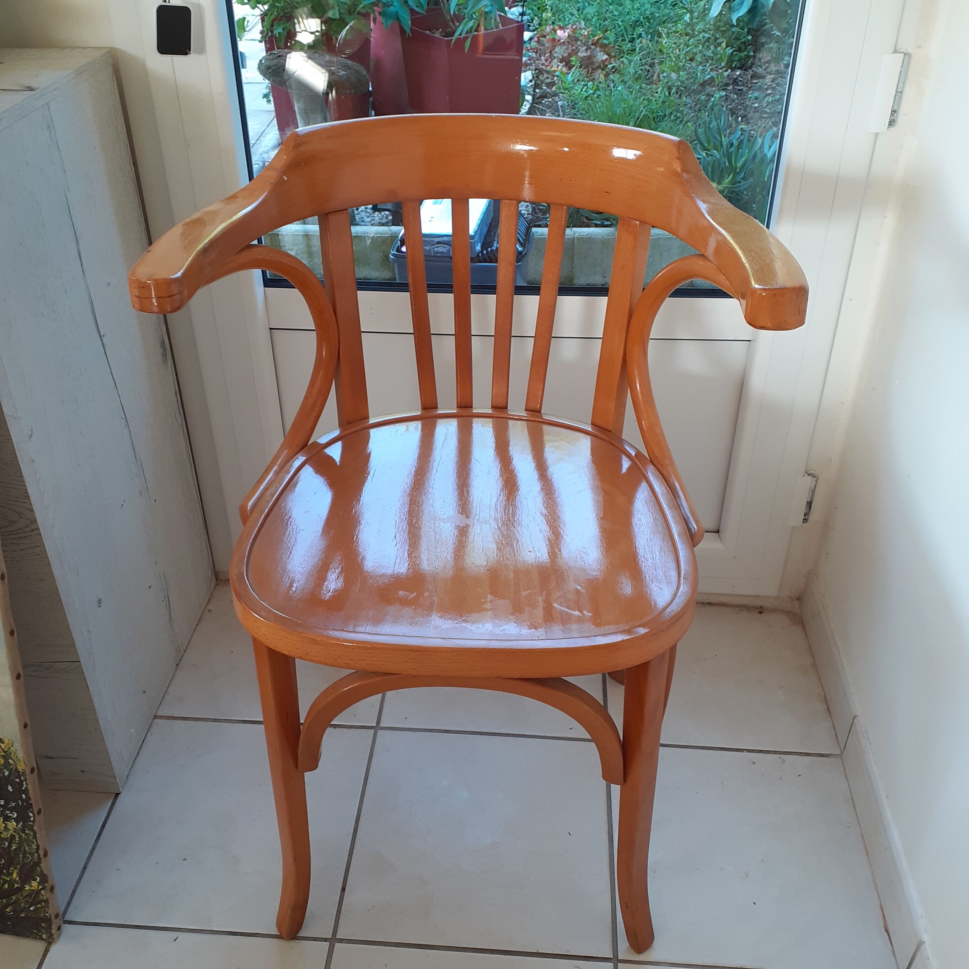Baumann armchair in light beech. With its label.