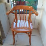 Baumann armchair in light beech. With its label.