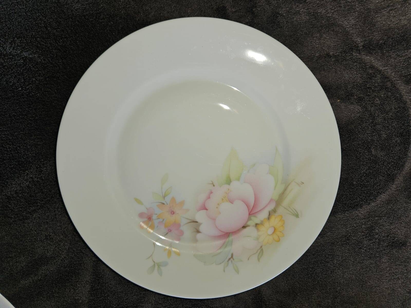 10 dessert plates made of Limoges porcelain, France.