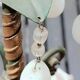 Italian cage chandelier decorated with ceramic roses and glass paste pendants