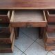 Vintage double-sided mahogany desk with 18 drawers.