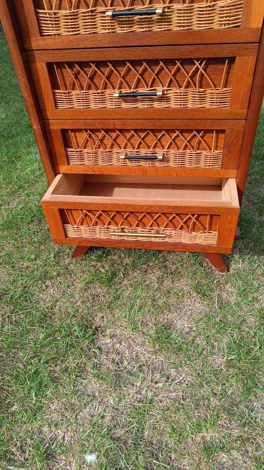 Tall chest of drawers in wood and rattan with splayed legs