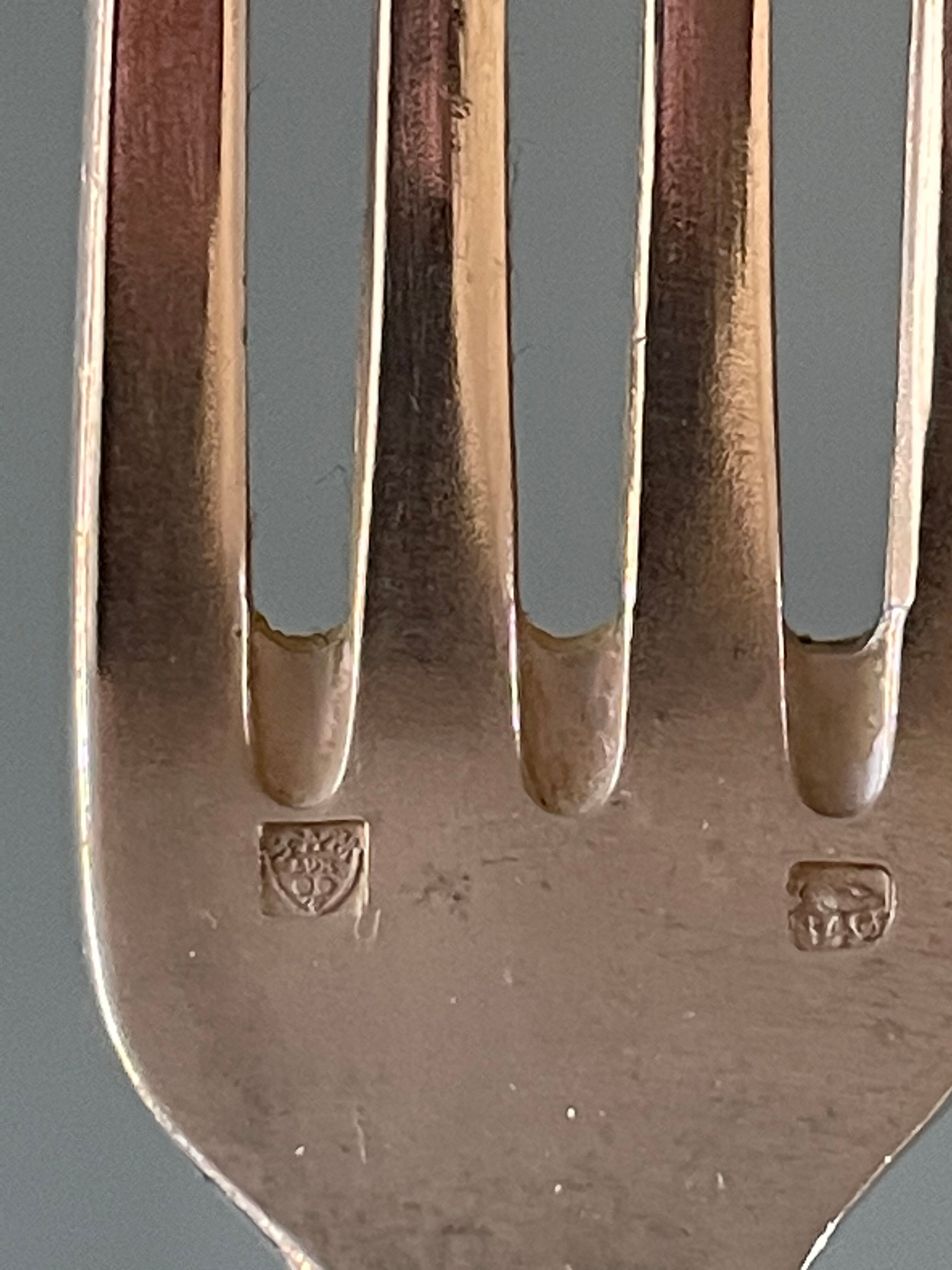 Series of 21 antique silver metal table forks