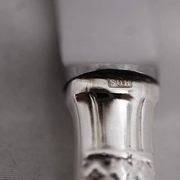 12 dessert, cheese, and hors d'oeuvre knives Grand Prix, Art Deco in silver-plated metal.