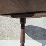Small rustic antique tripod side table made of solid wood.