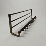 Mid century old industrial wall mounted coatrack