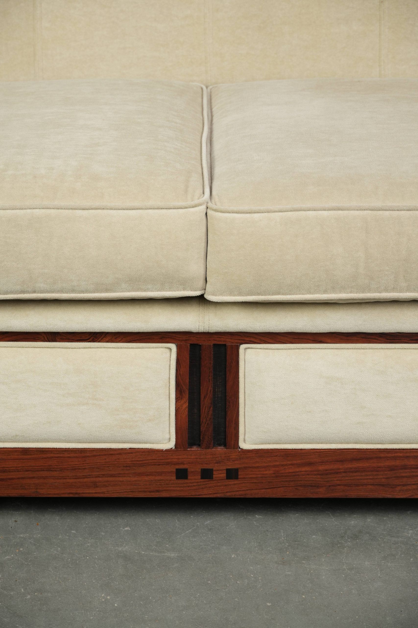 Art Deco design sofa with beautiful woodwork and cream fabric upholstery