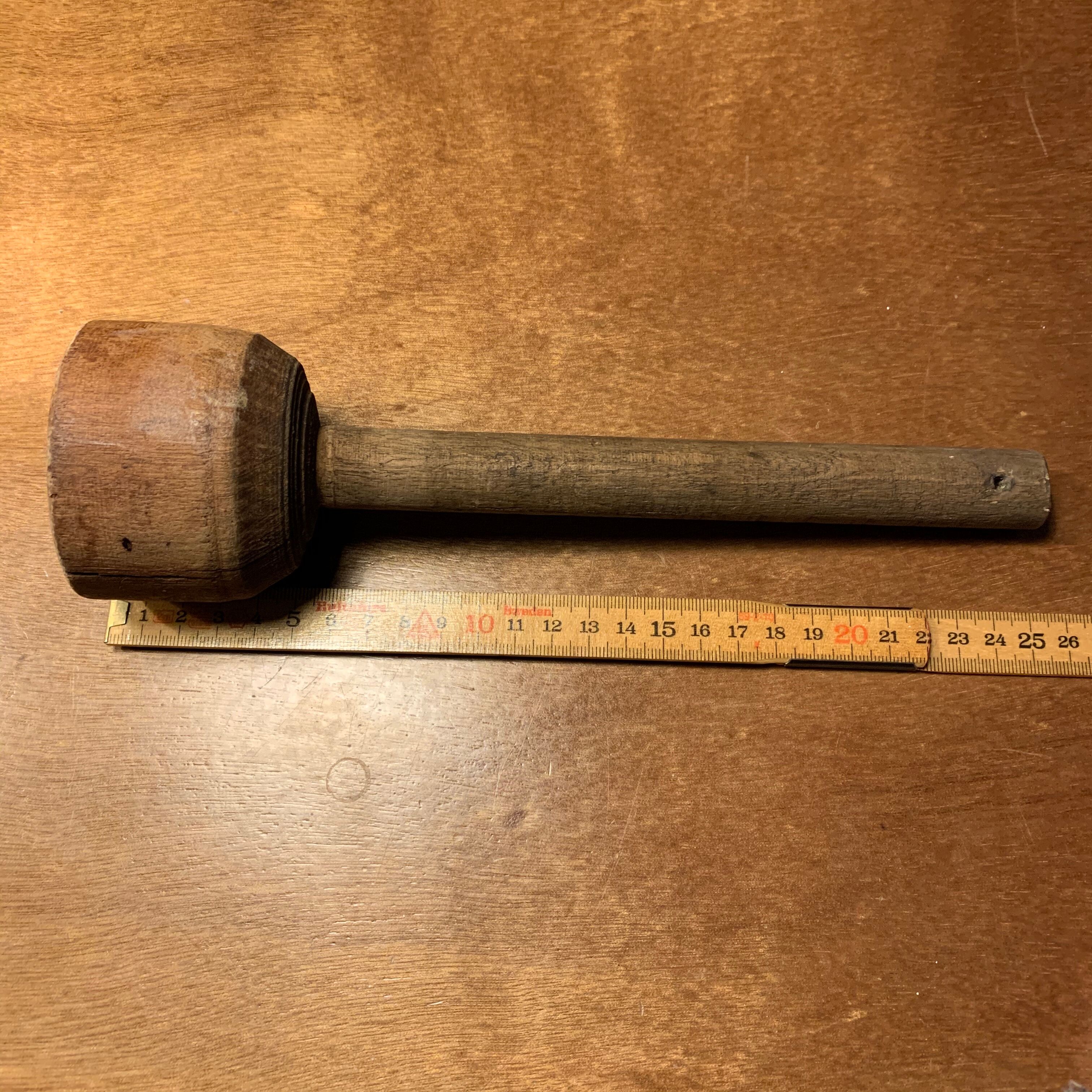 Old wooden pestle