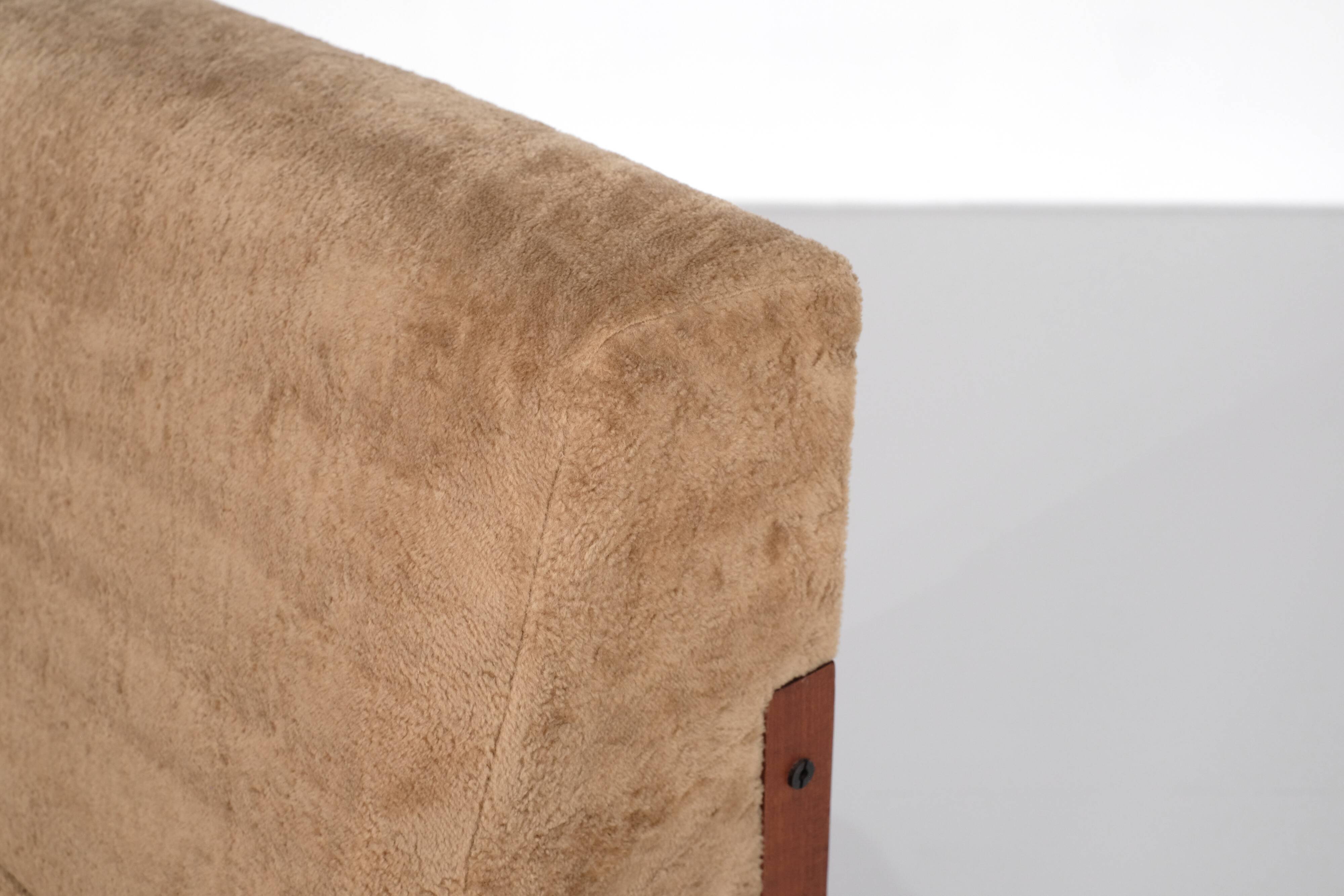 Wooden armchair covered in fabric, Italy, 1960s.
