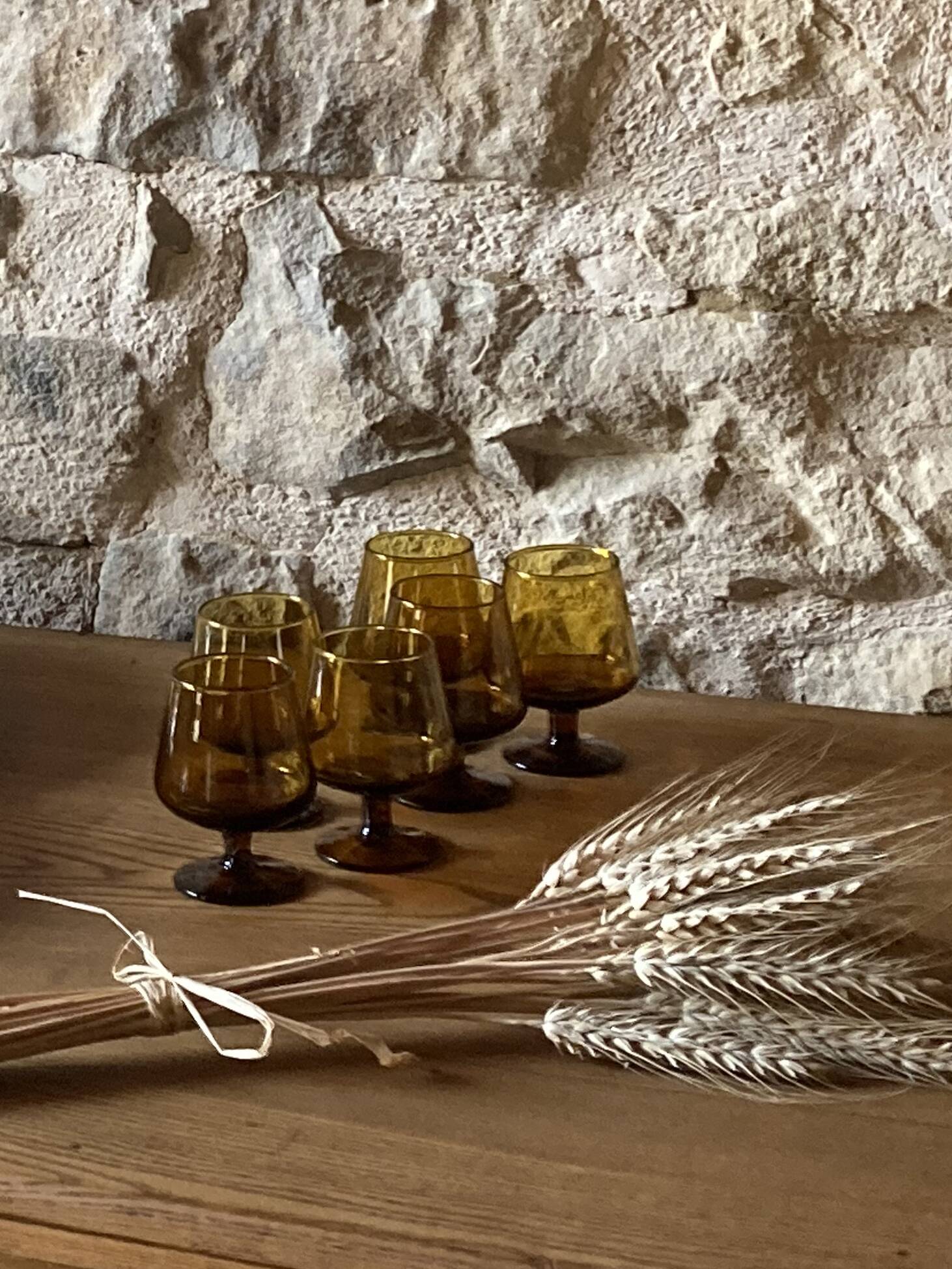 6 small amber glass stemmed glasses