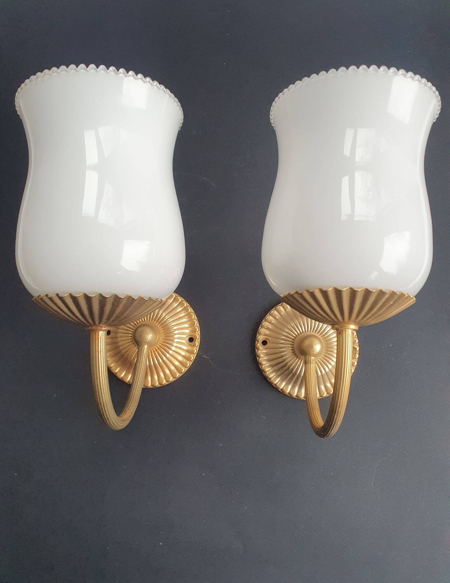 Pair of vintage gold-tone wall sconces with opaline glass globes