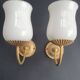 Pair of vintage gold-tone wall sconces with opaline glass globes