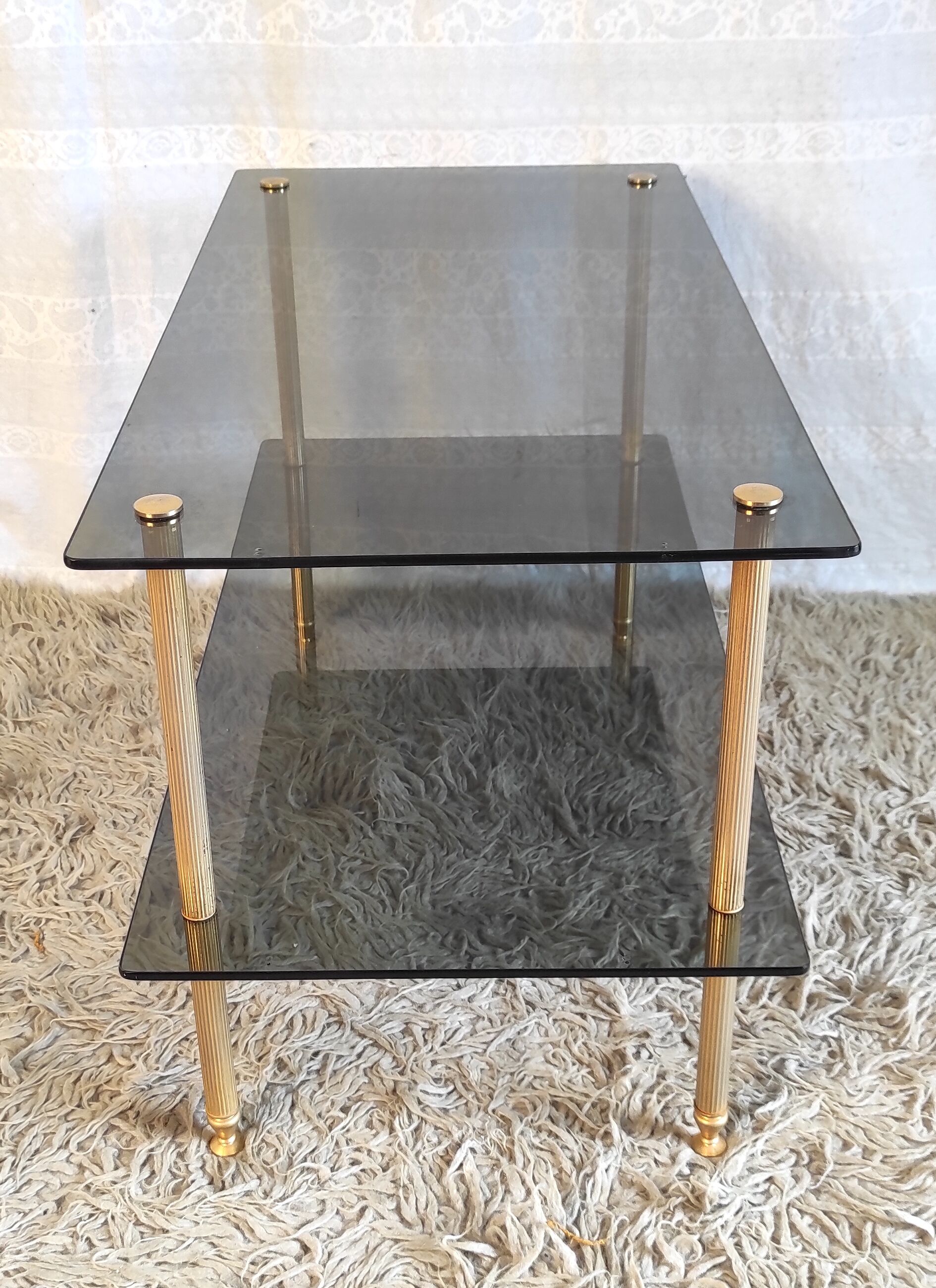 Coffee table in gilded metal and smoked glass – 60s