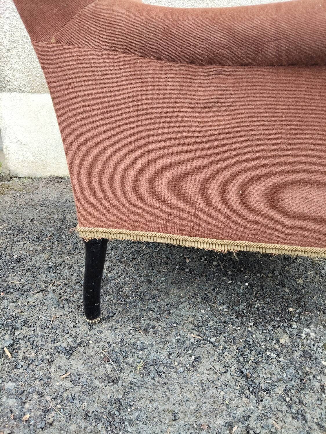 Antique brown velvet tub chair – turned legs and brass rings.