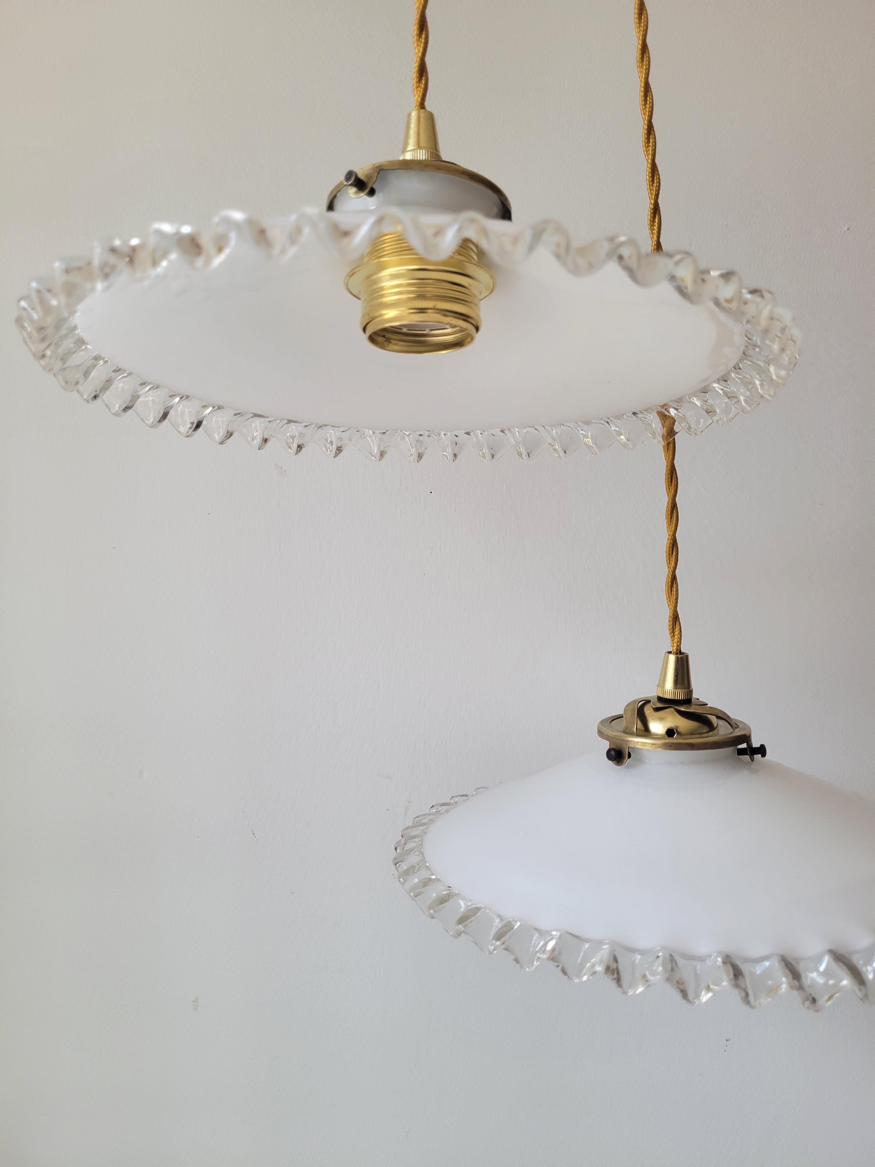 Duo of serrated opaline suspensions