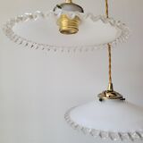 Duo of serrated opaline suspensions