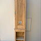 Small wardrobe in raw wood