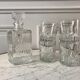Set of a decanter and 4 vintage whiskey glasses 70s