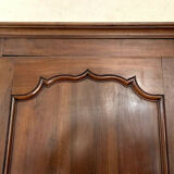 Louis XV bonnetière in solid walnut around 1800