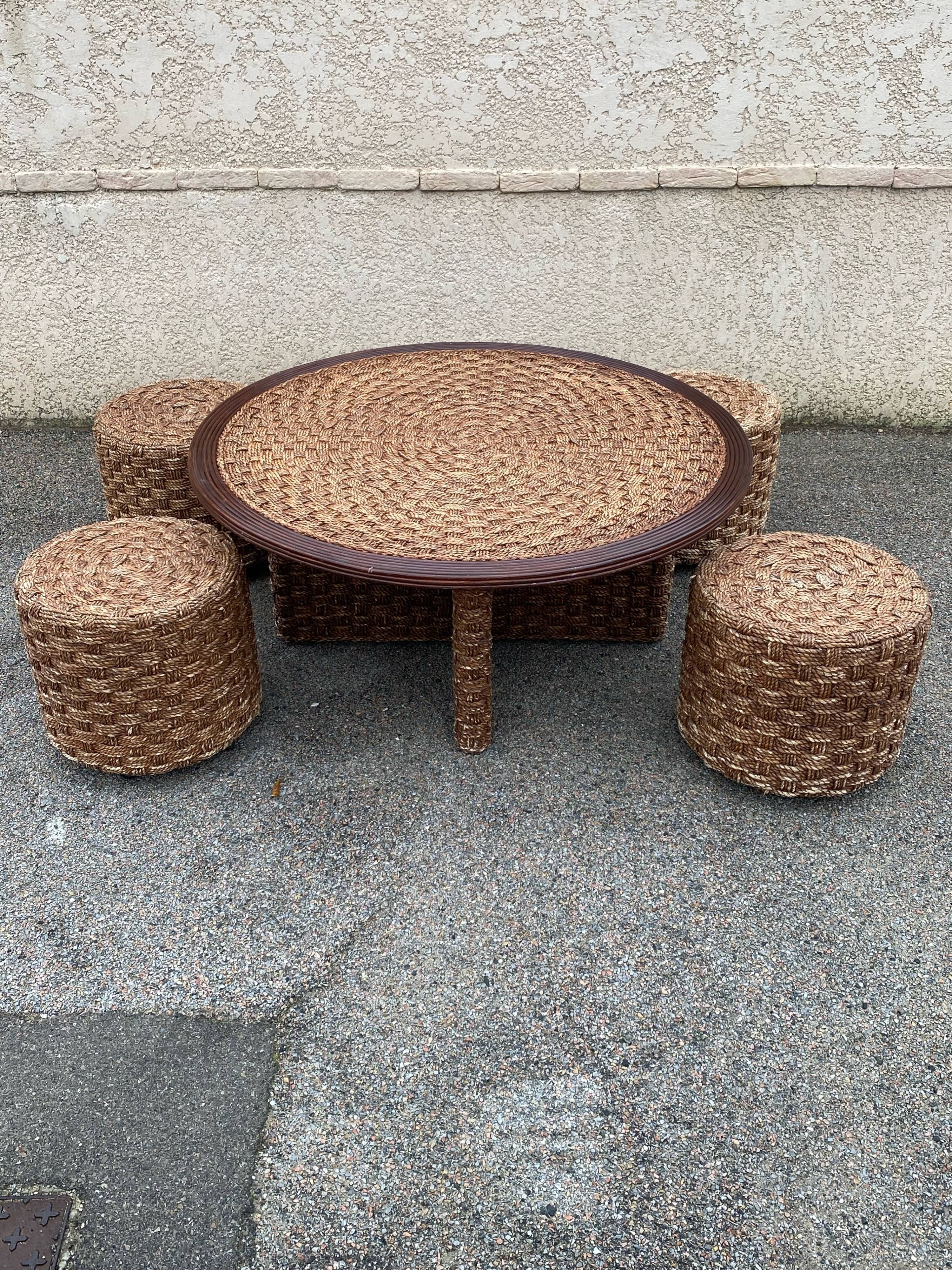 A coffee table and four rope stools 1960/1970