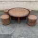 A coffee table and four rope stools 1960/1970
