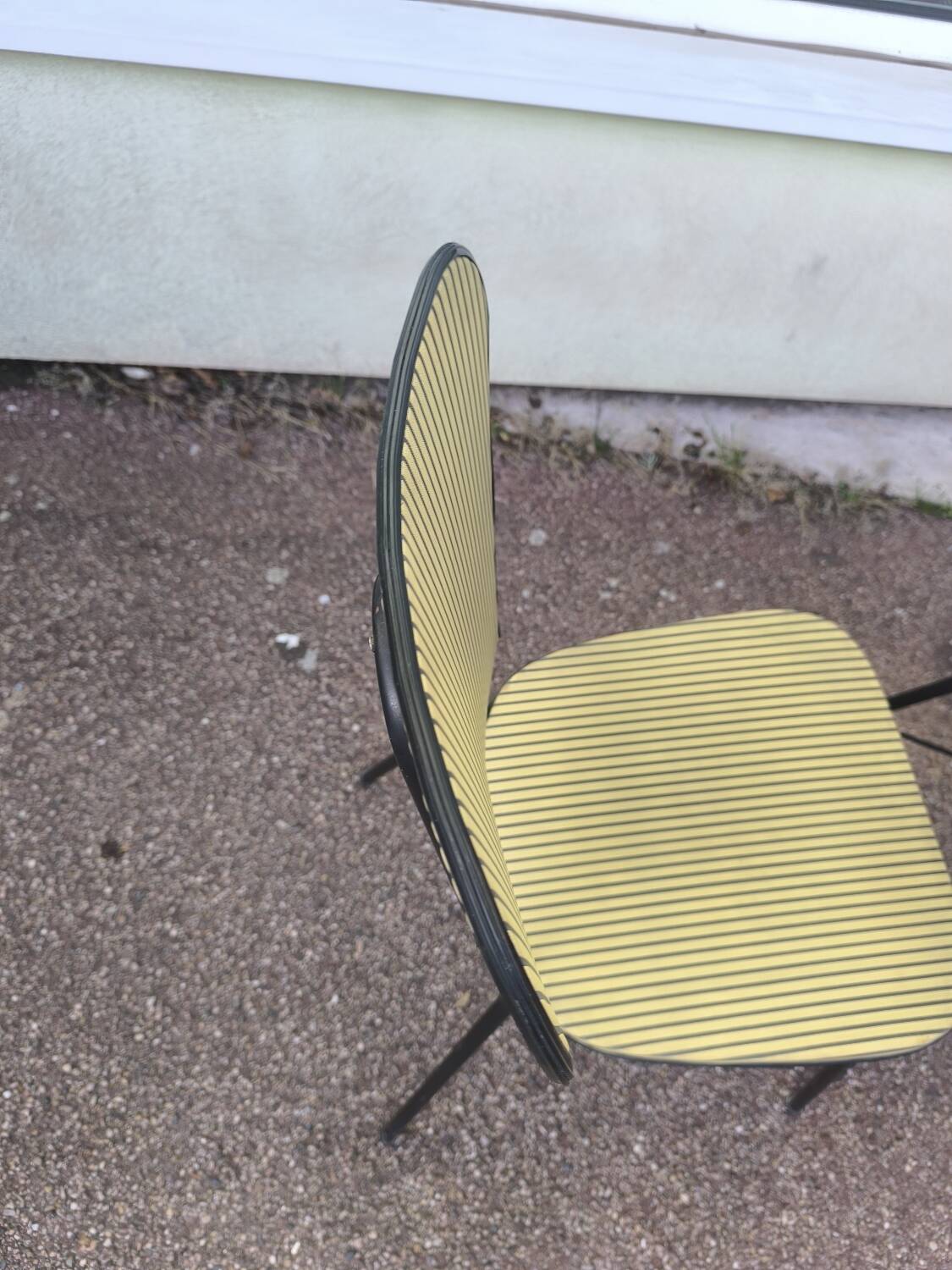 Set of 3 vintage yellow and red faux leather chairs.