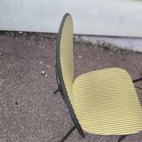 Set of 3 vintage yellow and red faux leather chairs.