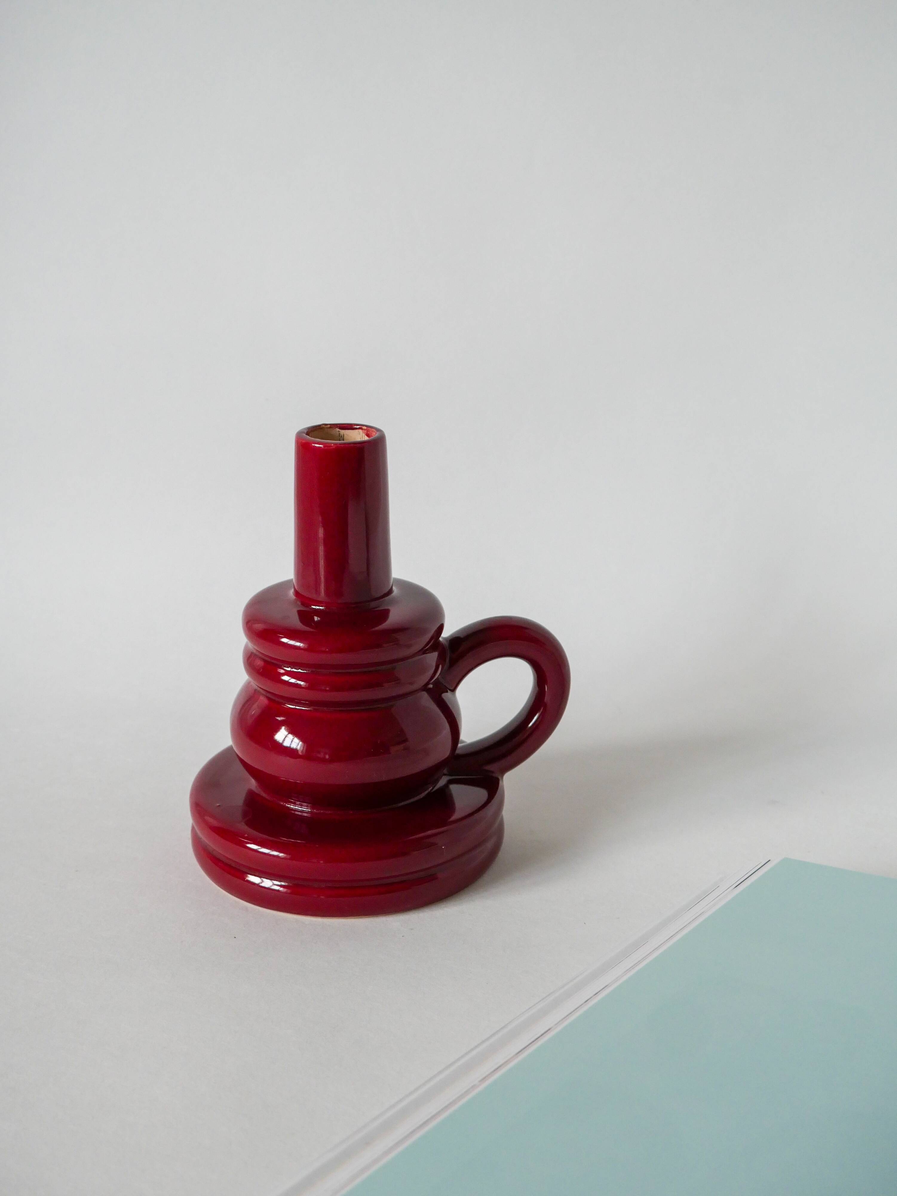 large burgundy ceramic candle holder numbered 1970