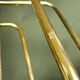 Vintage gold metal magazine rack – minimalist design – 1970s