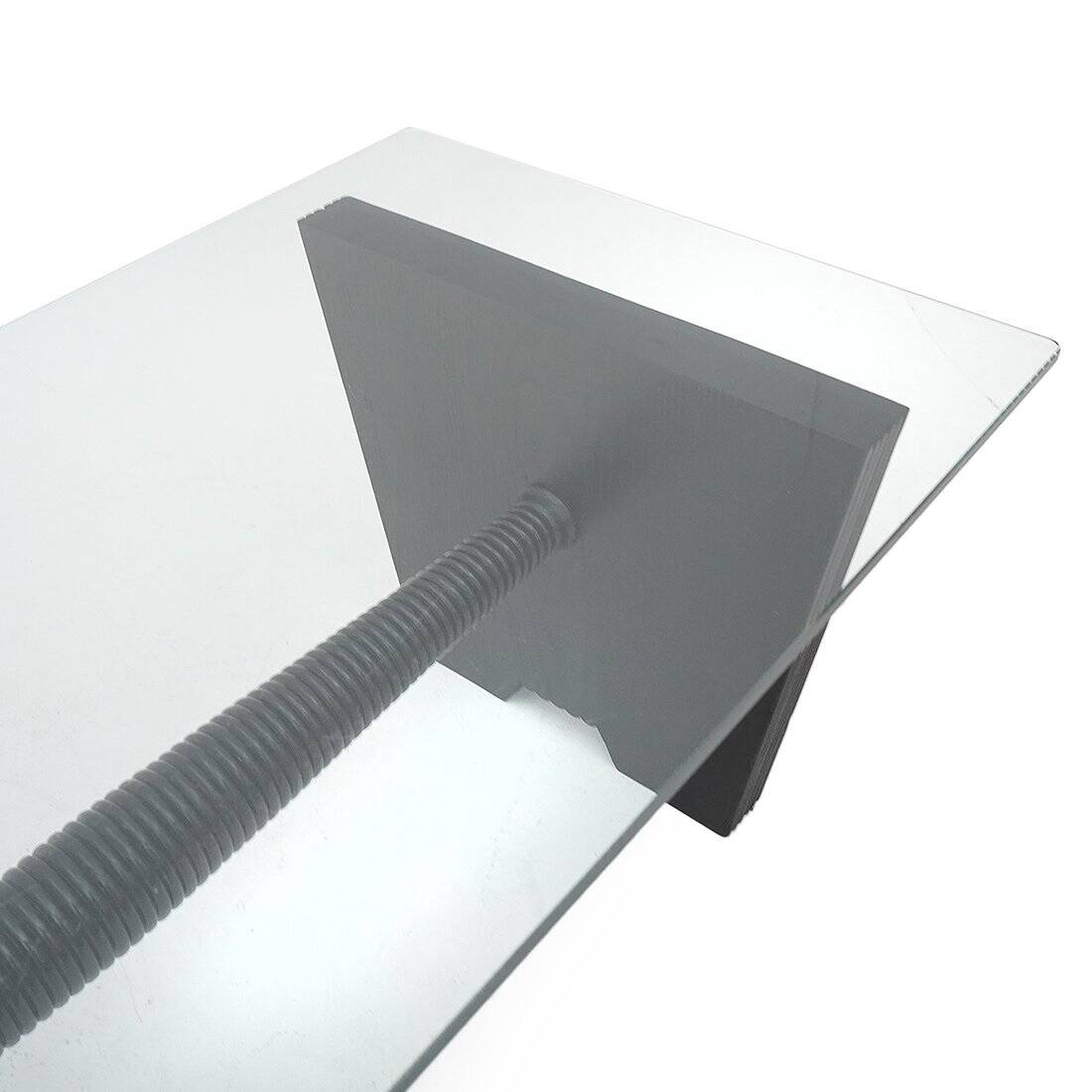 Coffee table with a glass top and black stained wood frame, 1930s.