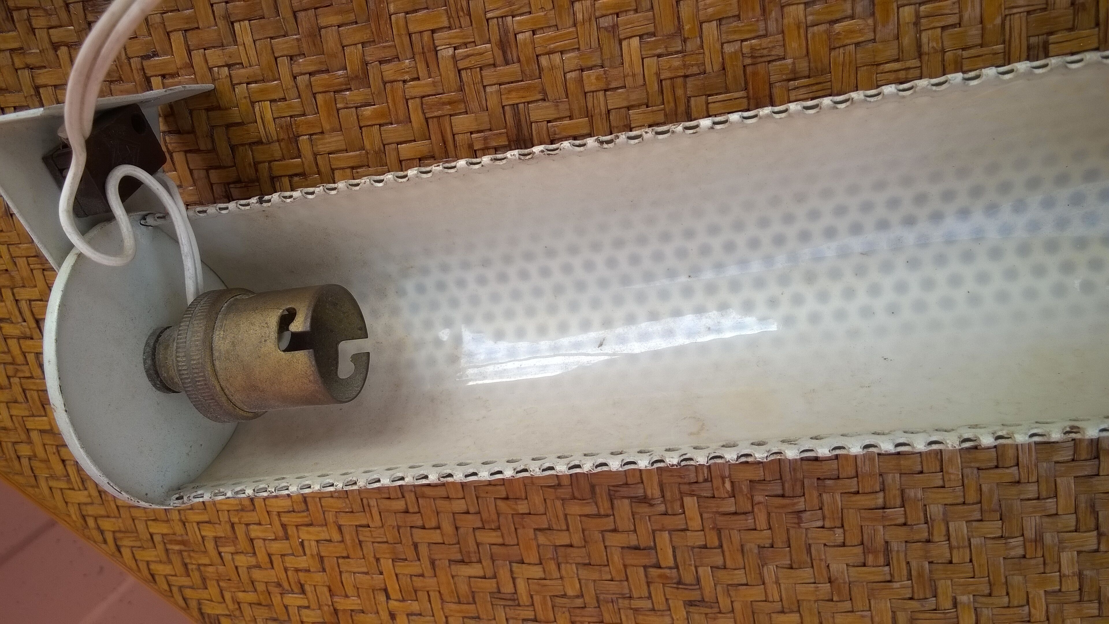 Perforated tole sconce