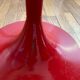 Pair of low tulip stools in red metal 1970