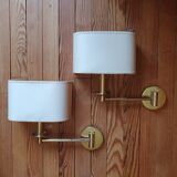 Pair of brass articulated wall sconces