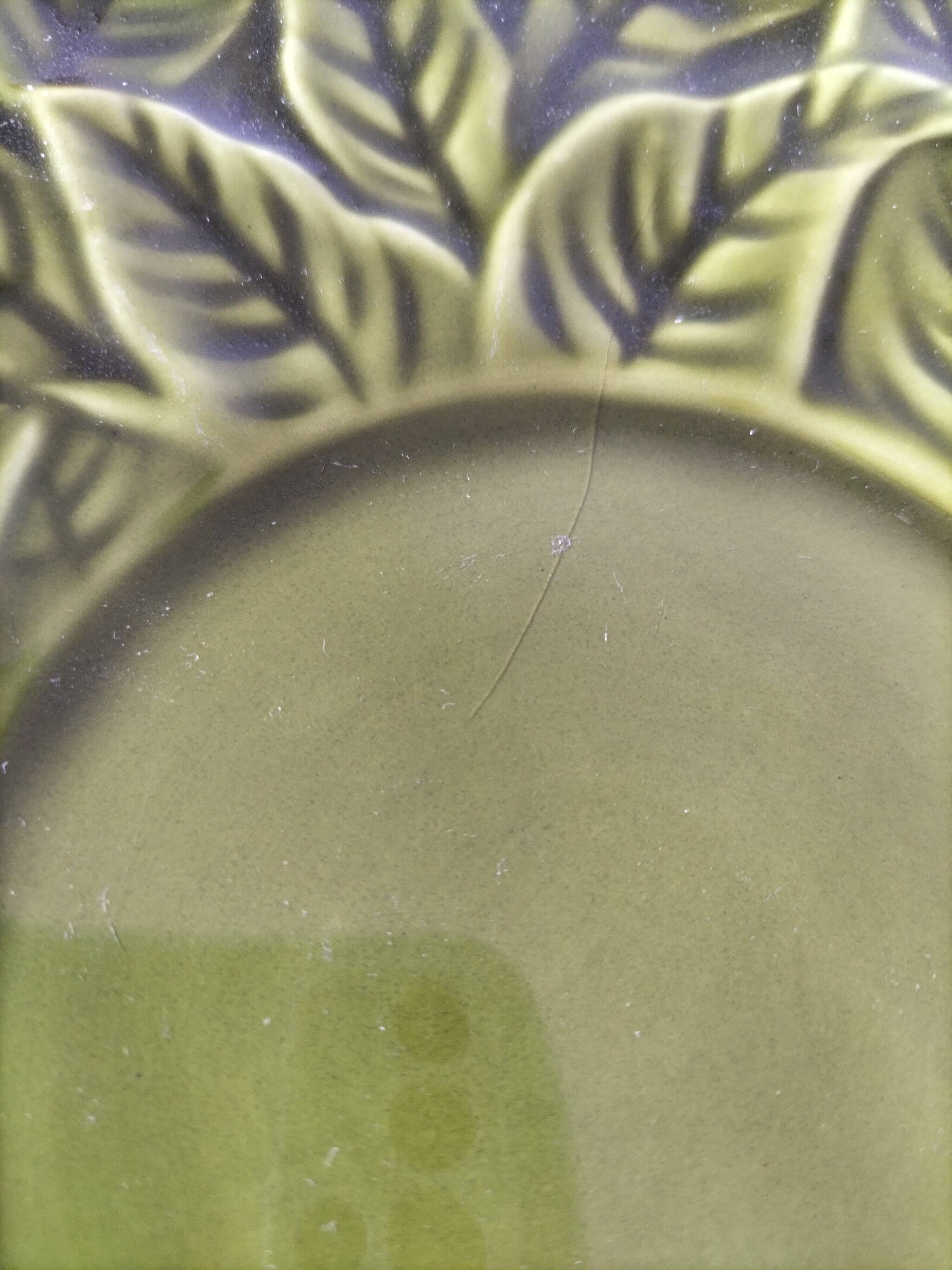 Vintage plate with olive green foliage relief