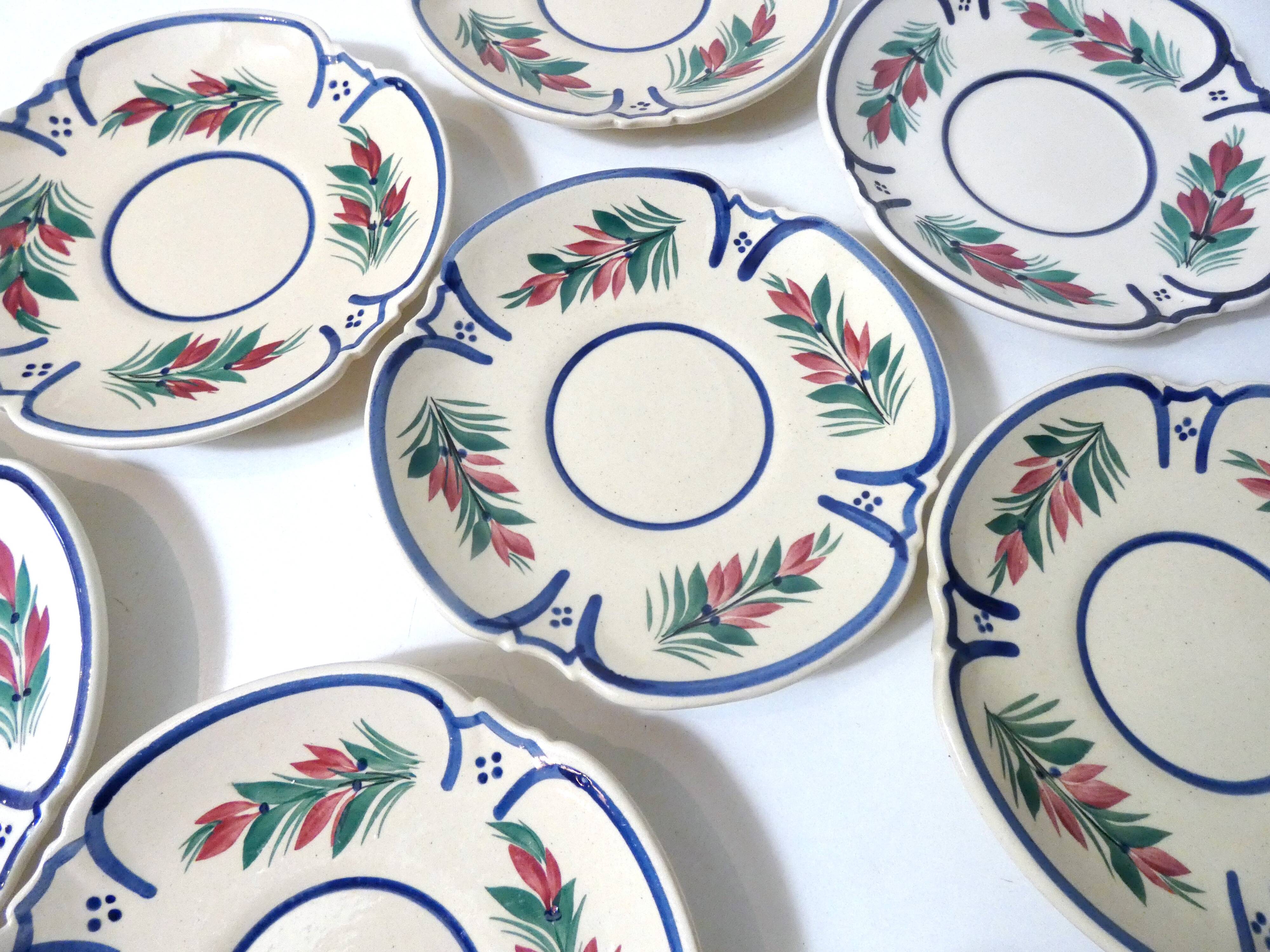 8 Henriot Quimper plates