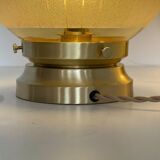 Pair of large art deco globe table lamps with brass legs