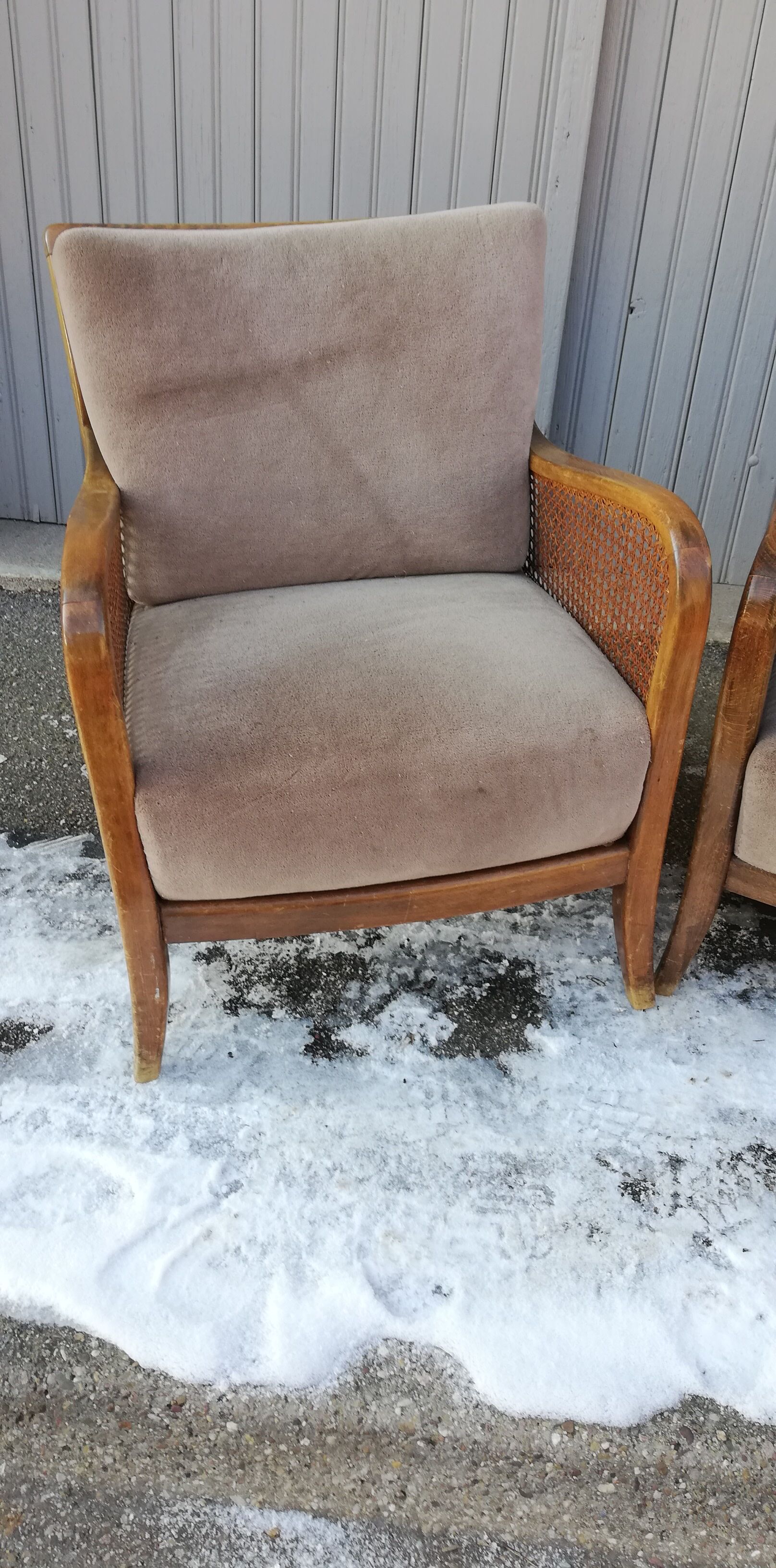 Pair of vintage cannage and fabric armchairs
