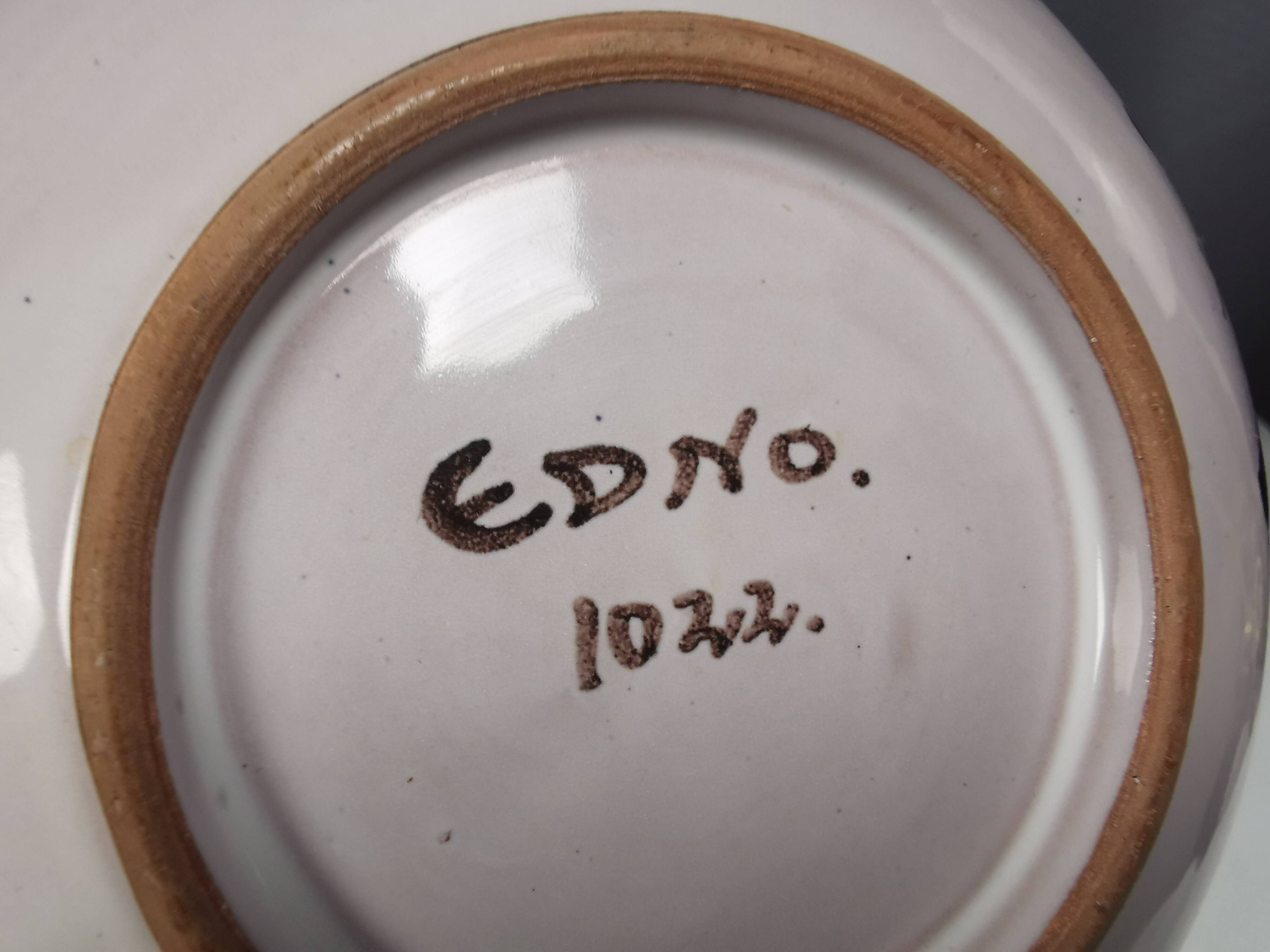 Beautiful small painted ceramic basket with woven handle