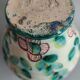 Vase fleuri vert pastel vintage