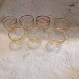 7 vintage mini shot glasses.